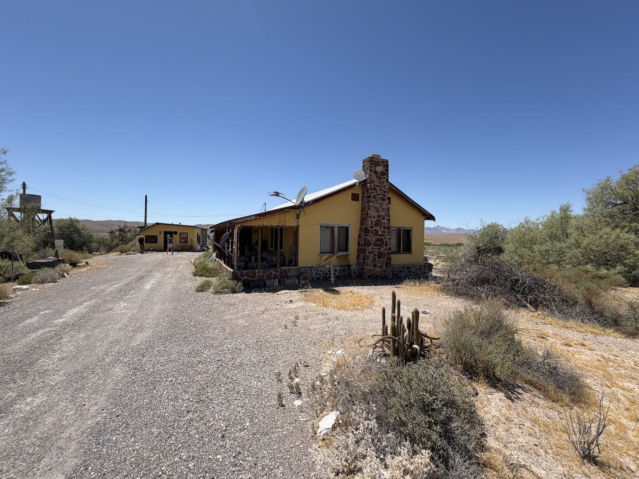 481 Downey Road Tecopa, CA 92389 - Photo 2 of 7 a front view of a house with a yard
