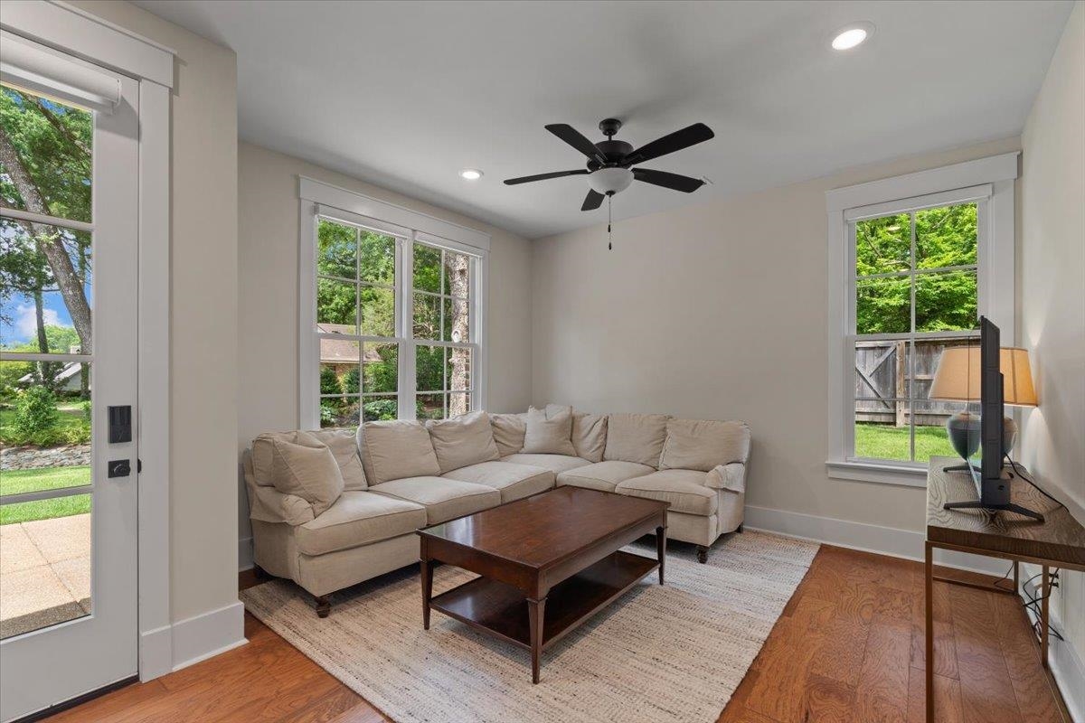 240 Burrows Road Collierville, TN 38017 - Photo 20 of 37 Living area featuring warm wood-finish flooring, recessed lighting, and a ceiling fan