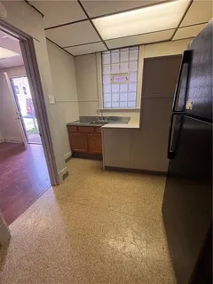 a bathroom with a sink a toilet and bathtub