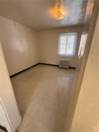 a view of a bathroom with a sink and a mirror