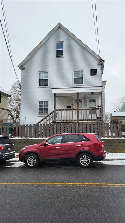 a cars parked in front of a house