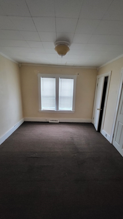 238 Hildreth Street, Unit 238 Lowell, MA 01850 - Photo 16 of 16 an empty room with a window