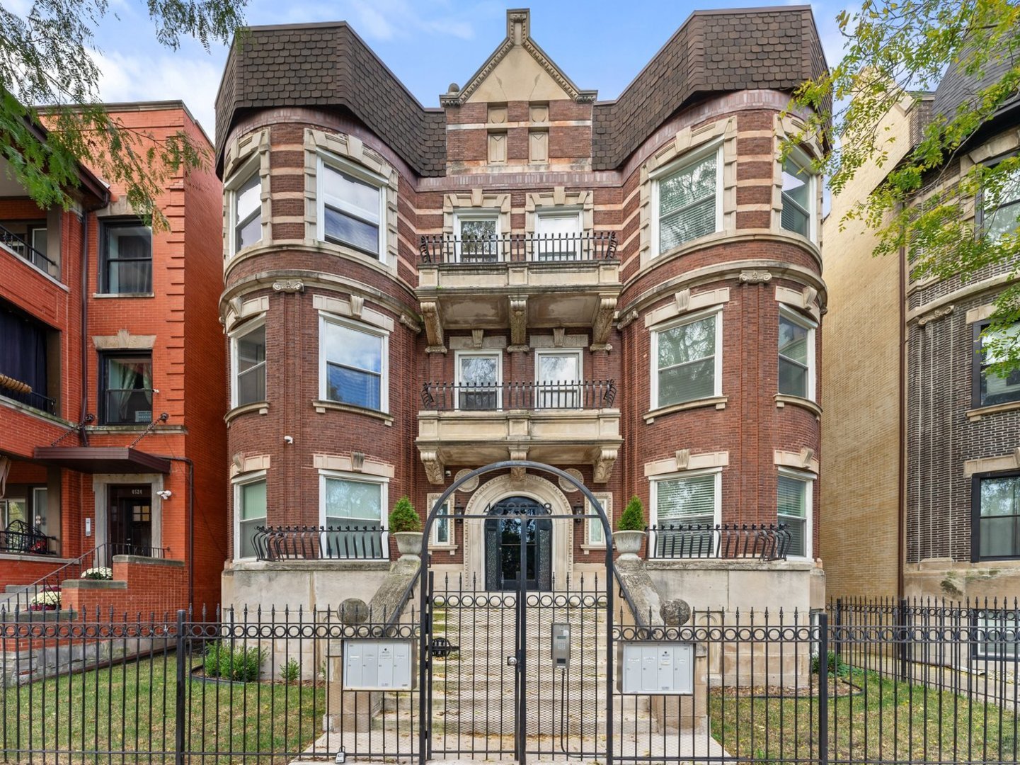 an aerial view of a brick building