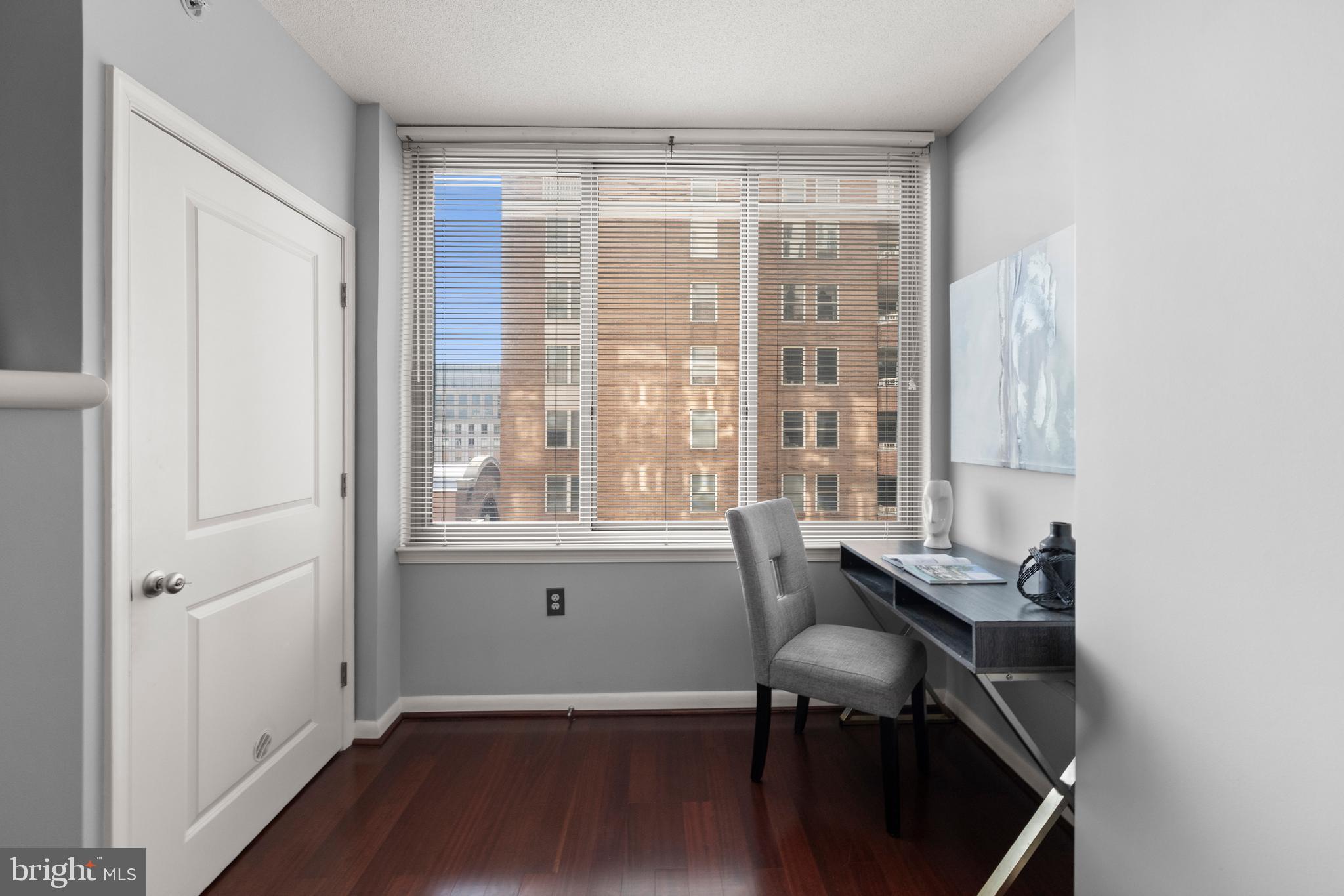 851 North Glebe Road, Unit 1508 Arlington, VA 22203 - Photo 15 of 41 a room with furniture and a window