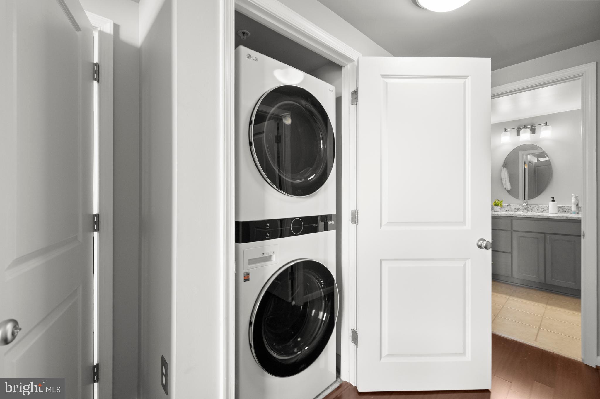 851 North Glebe Road, Unit 1508 Arlington, VA 22203 - Photo 25 of 41 a utility room with dryer and washer