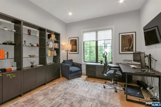 a workspace with furniture and a window