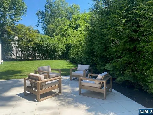 a garden view with a seating space