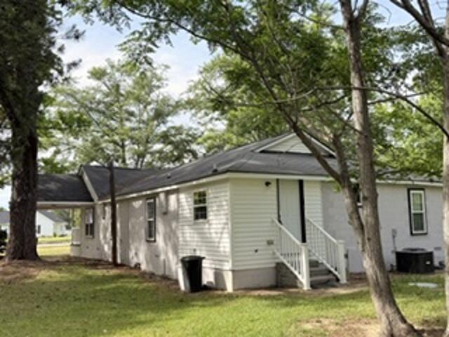 4741 Narrow Paved Road Lynchburg, SC 29080 - Photo 13 of 15 Rear view and carport area.
