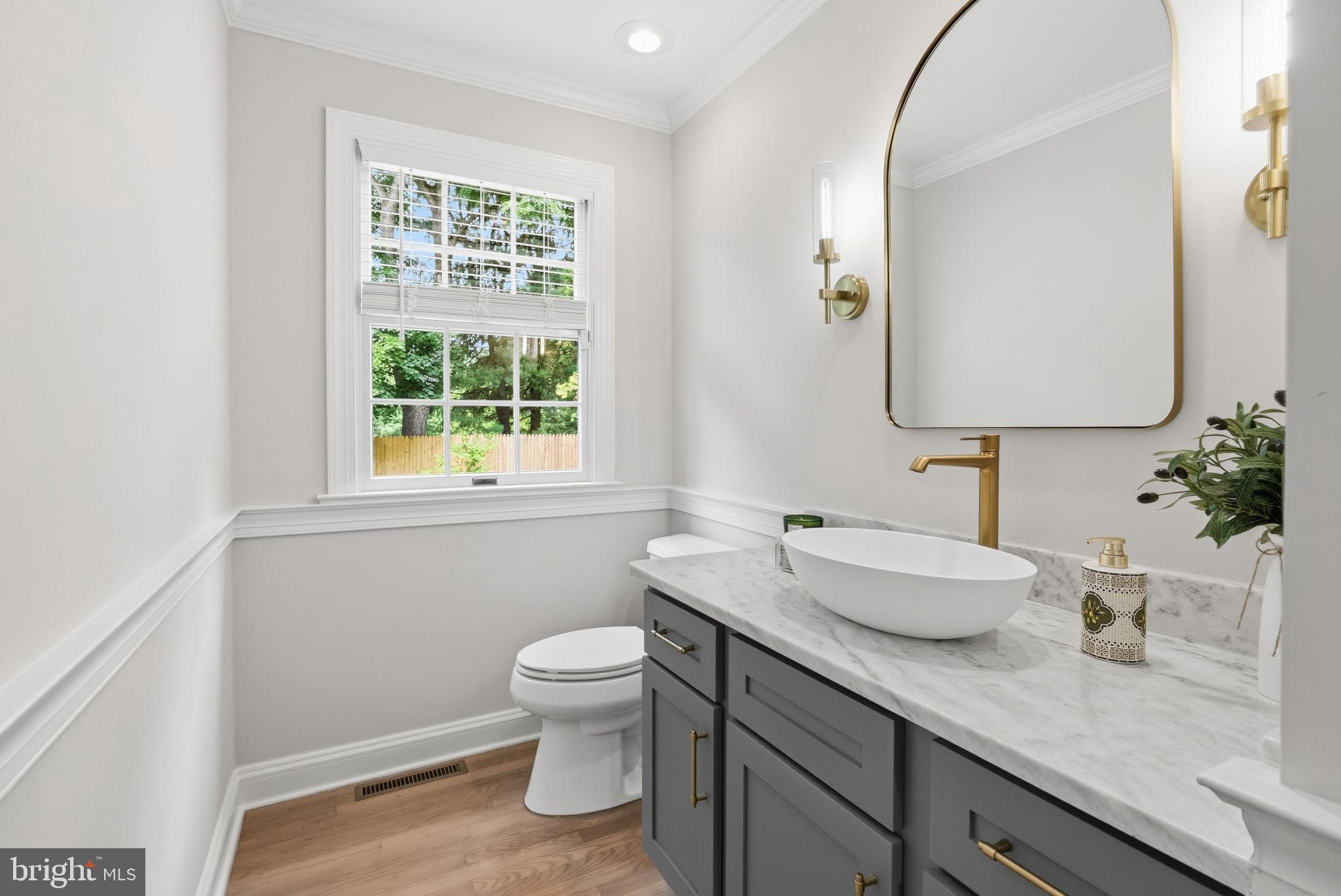 2971 Comfort Road New Hope, PA 18938 - Photo 21 of 60 a bathroom with a granite countertop sink mirror vanity and toilet