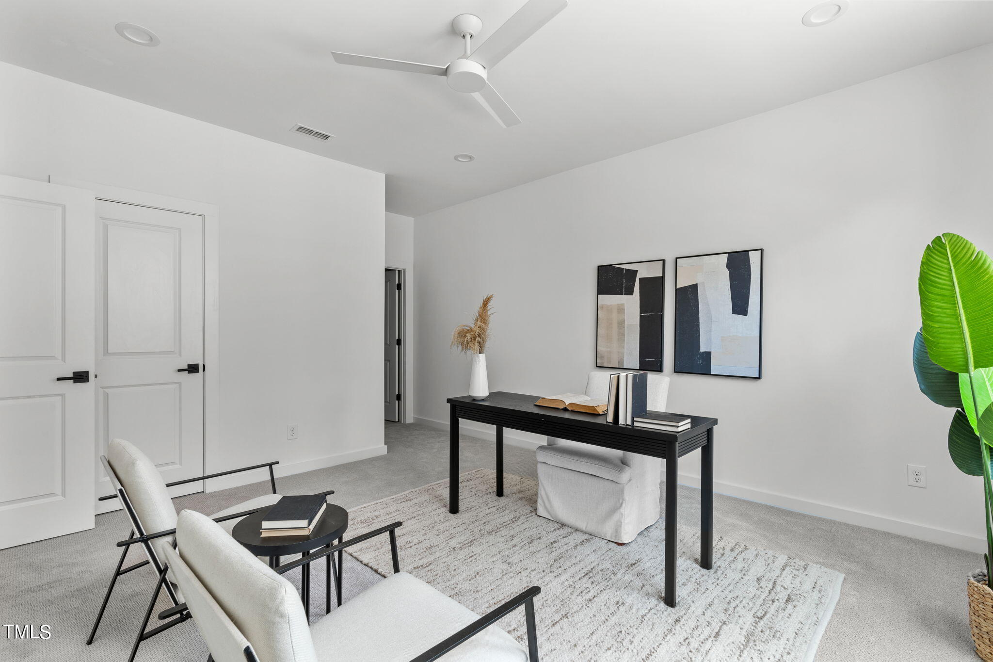 6402 Tanner Oak Lane Raleigh, NC 27613 - Photo 27 of 50 a view of a workspace with furniture