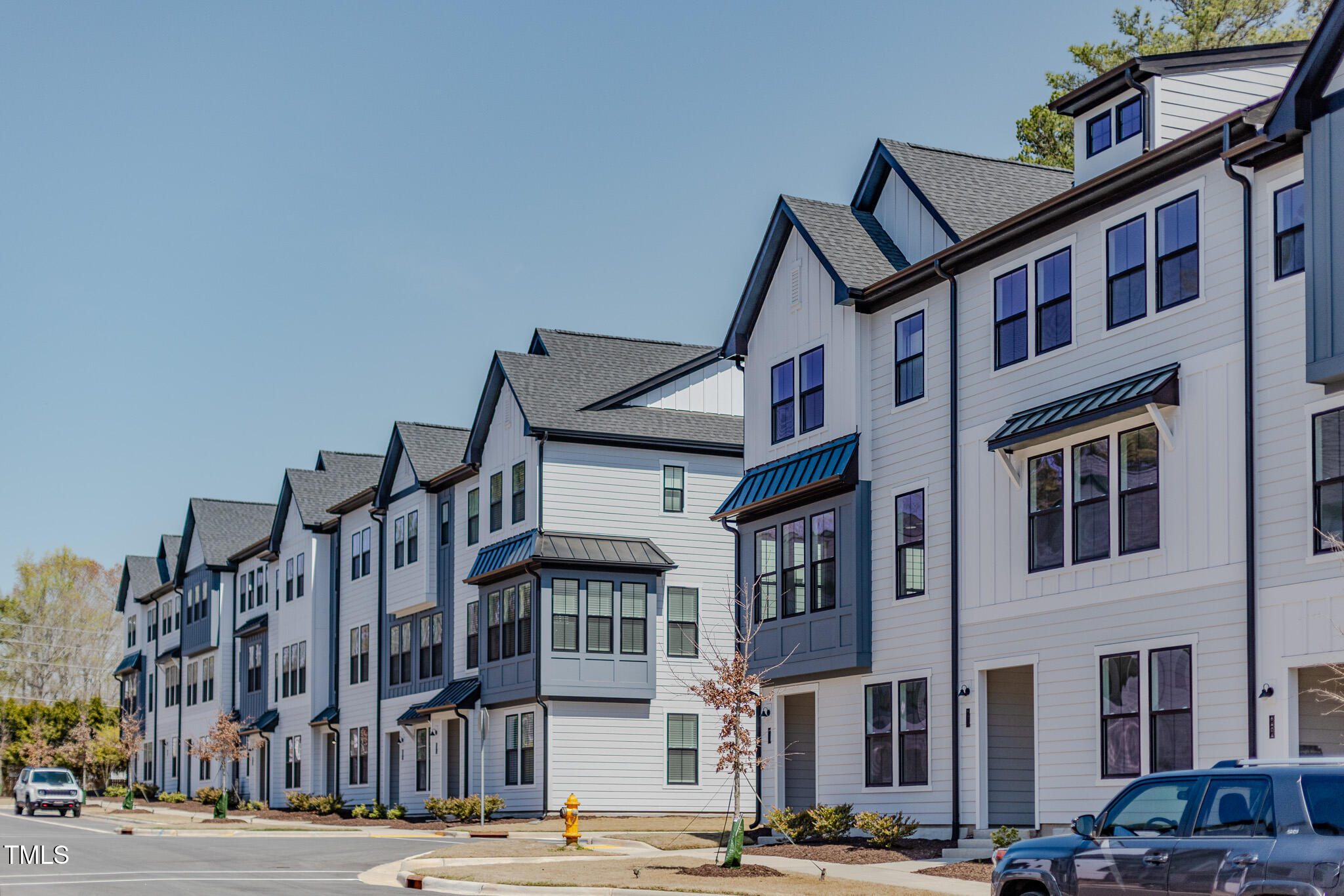 6402 Tanner Oak Lane Raleigh, NC 27613 - Photo 30 of 50 a view of a building with a street