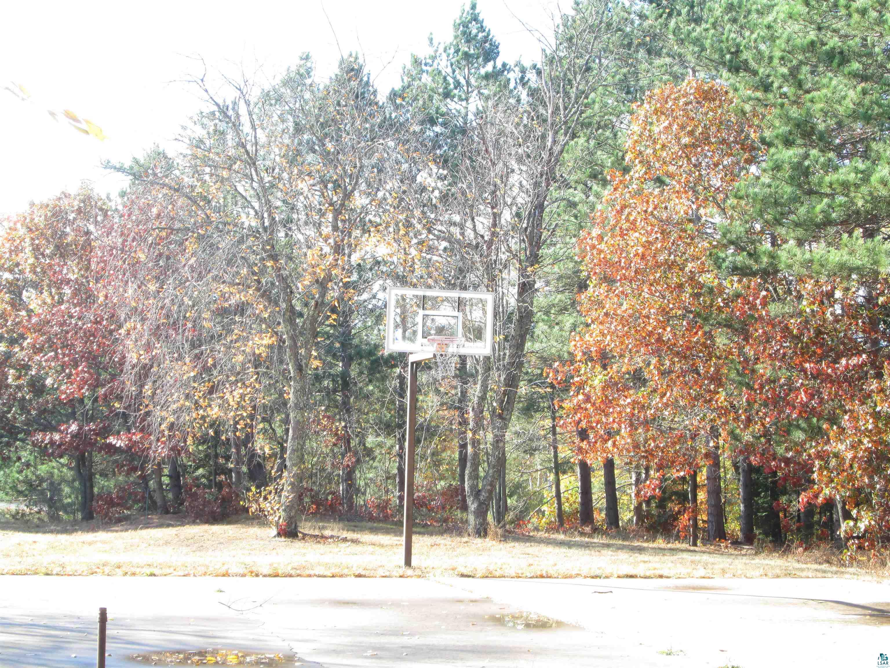 6030 Mitchell Road Iron River, WI 54847 - Photo 41 of 45 View of sport court featuring community basketball court