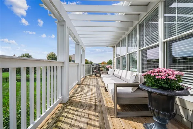 a view of balcony with furniture