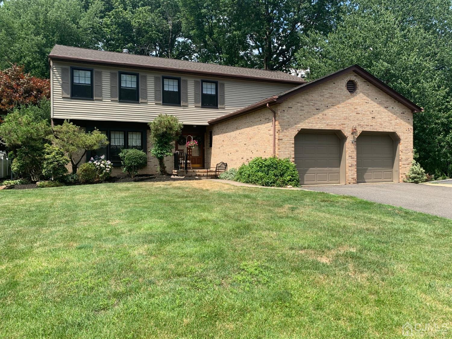2 Fox Hill Road Edison, NJ 08820 - Photo 1 of 37 a front view of a house with a yard