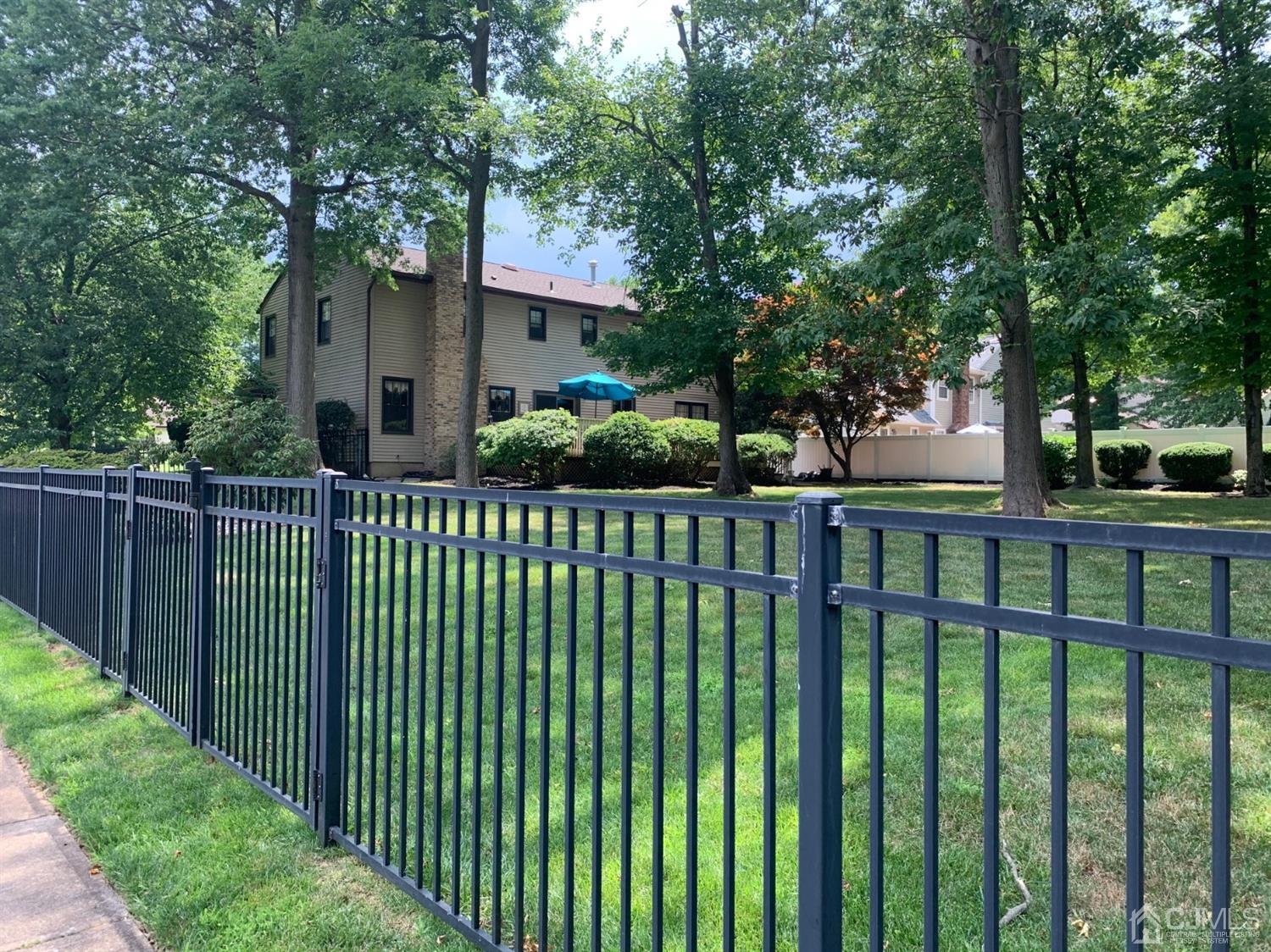 2 Fox Hill Road Edison, NJ 08820 - Photo 3 of 37 a front view of a house having yard