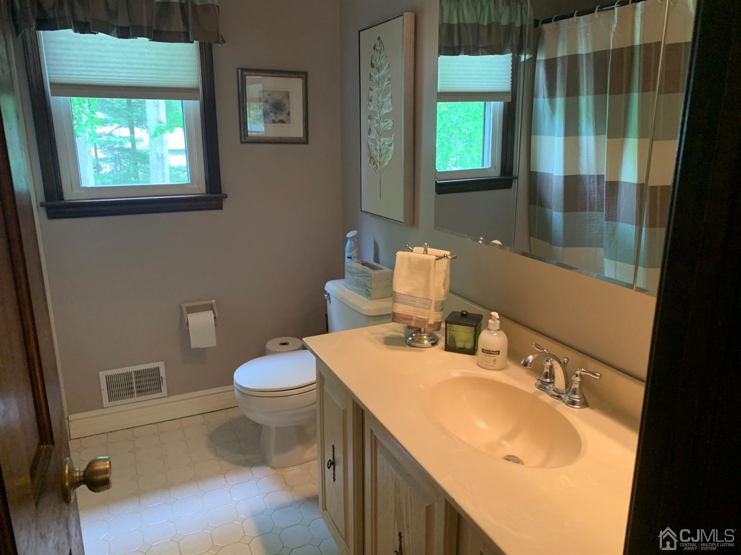 2 Fox Hill Road Edison, NJ 08820 - Photo 31 of 37 a bathroom with a sink toilet and shower