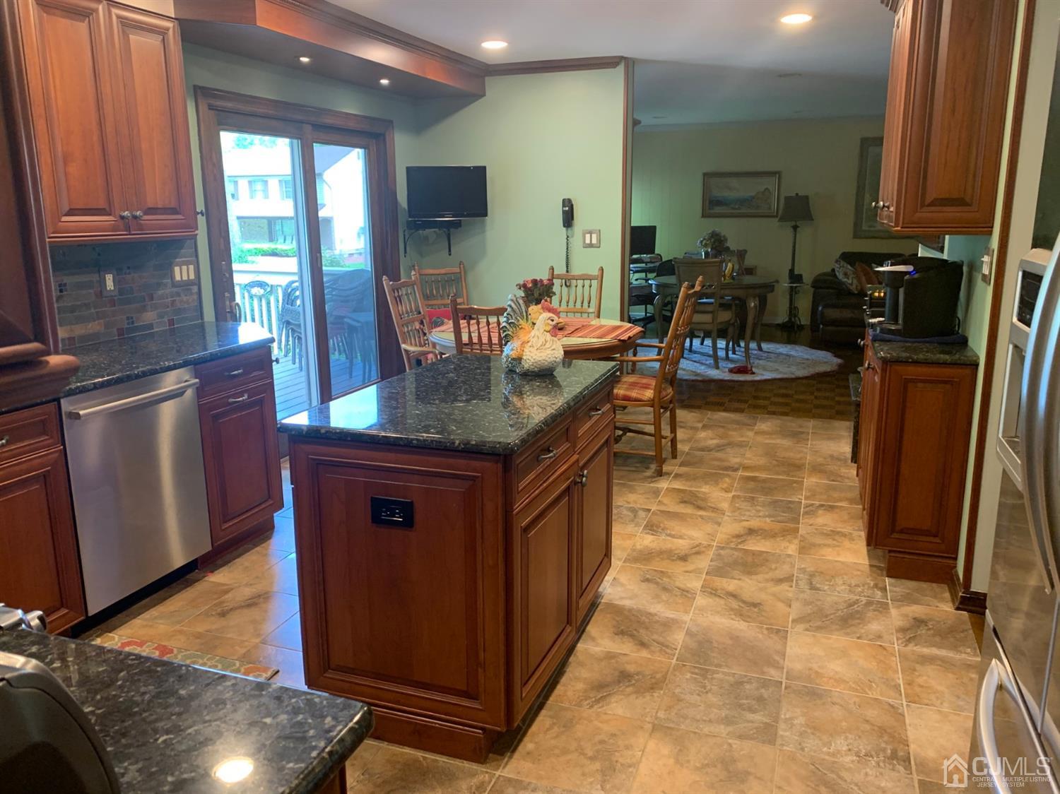2 Fox Hill Road Edison, NJ 08820 - Photo 10 of 37 a kitchen with stainless steel appliances granite countertop a stove a sink and a microwave