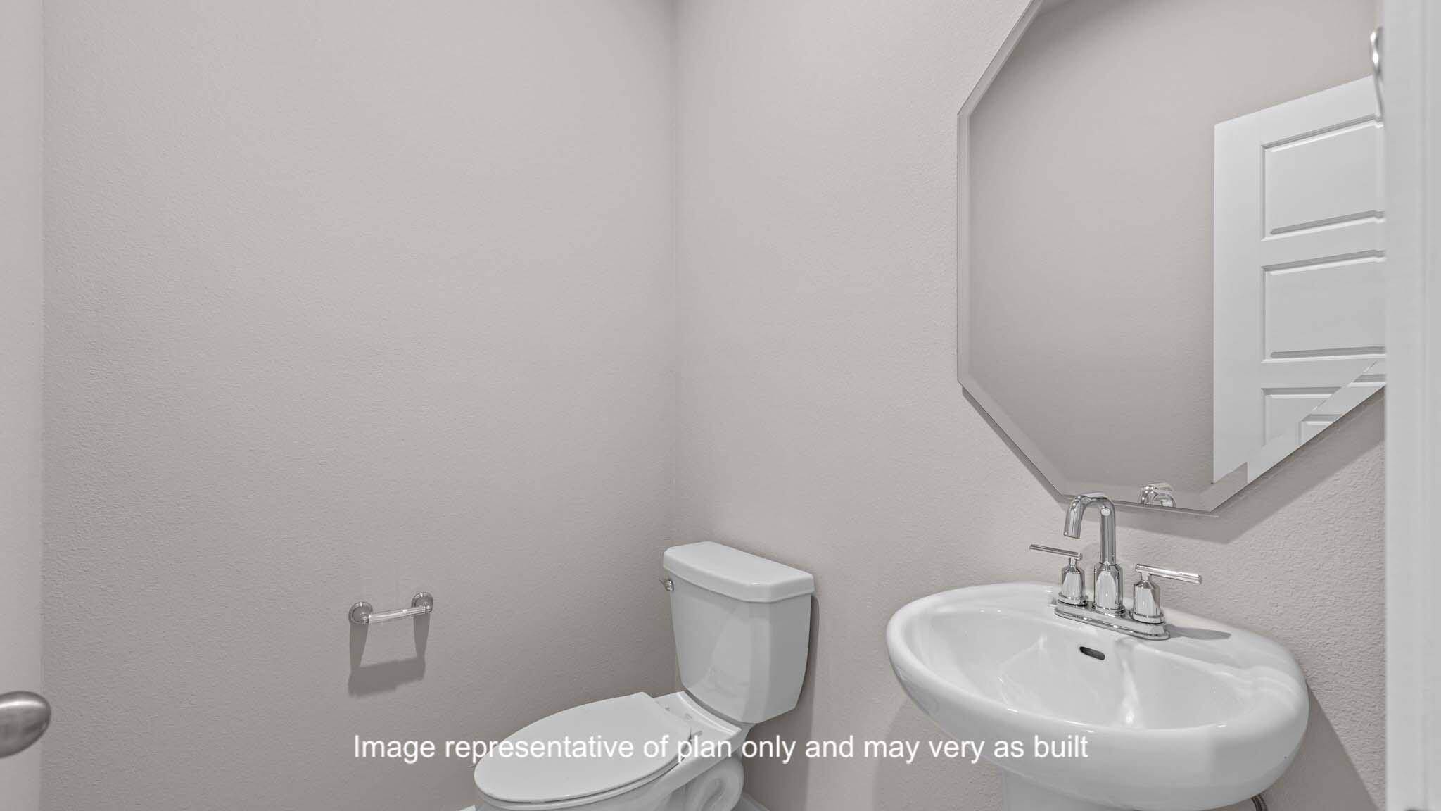 2902 134th Street Lubbock, TX 79423 - Photo 11 of 30 a bathroom with a sink and a toilet