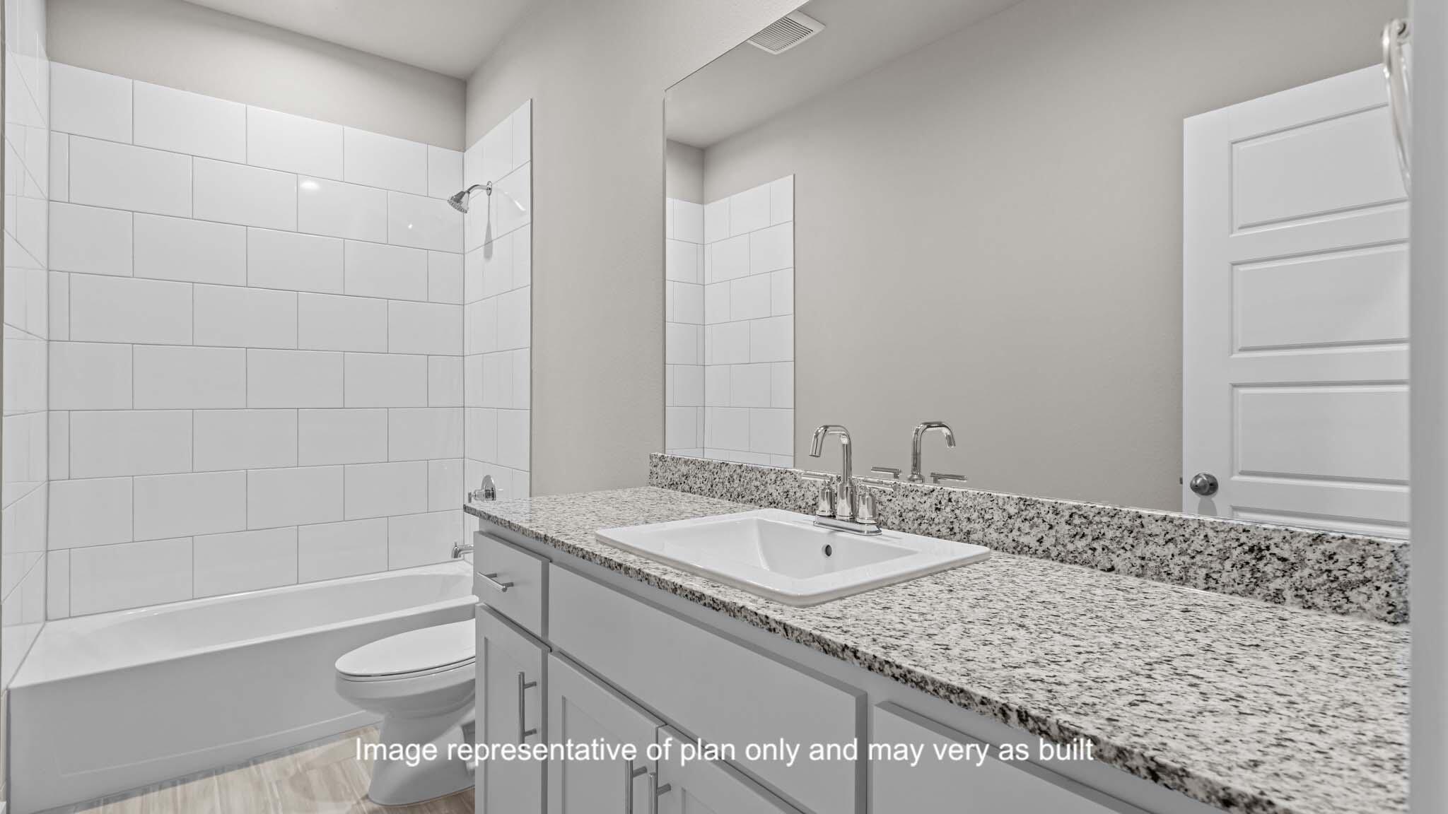 2902 134th Street Lubbock, TX 79423 - Photo 18 of 30 a bathroom with a granite countertop sink and a mirror
