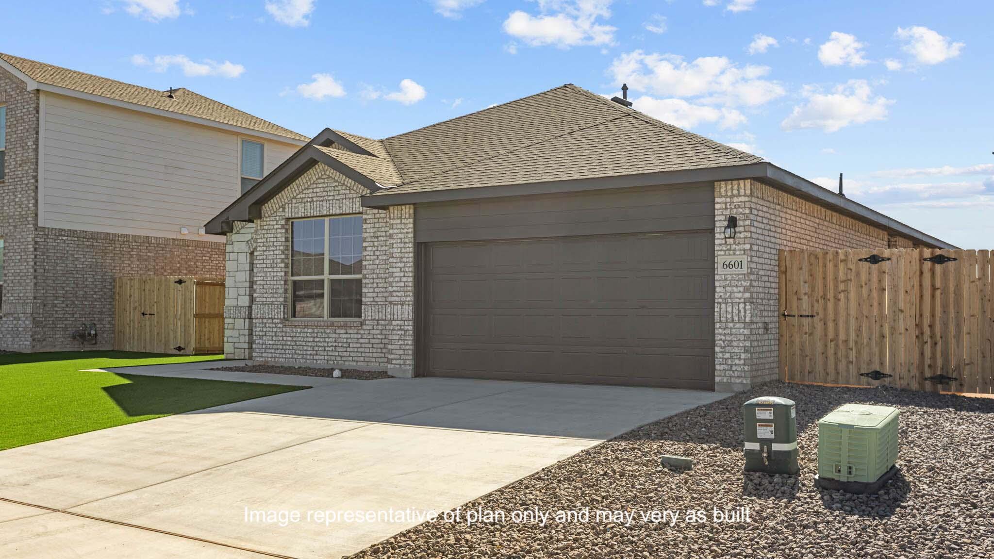 2902 134th Street Lubbock, TX 79423 - Photo 2 of 30 a front view of a house with a yard