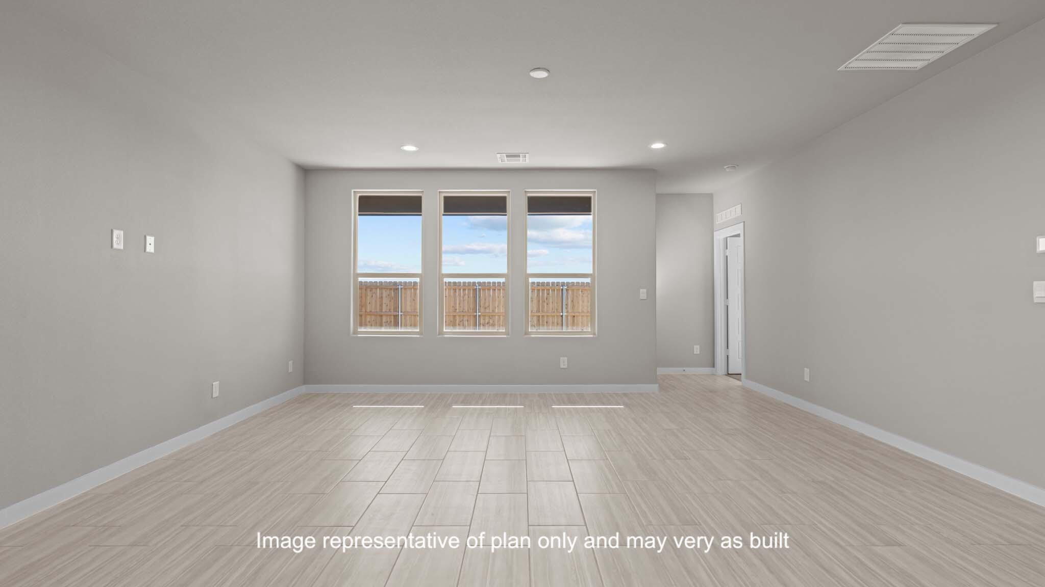 2902 134th Street Lubbock, TX 79423 - Photo 9 of 30 a view of empty room with wooden floor and fan