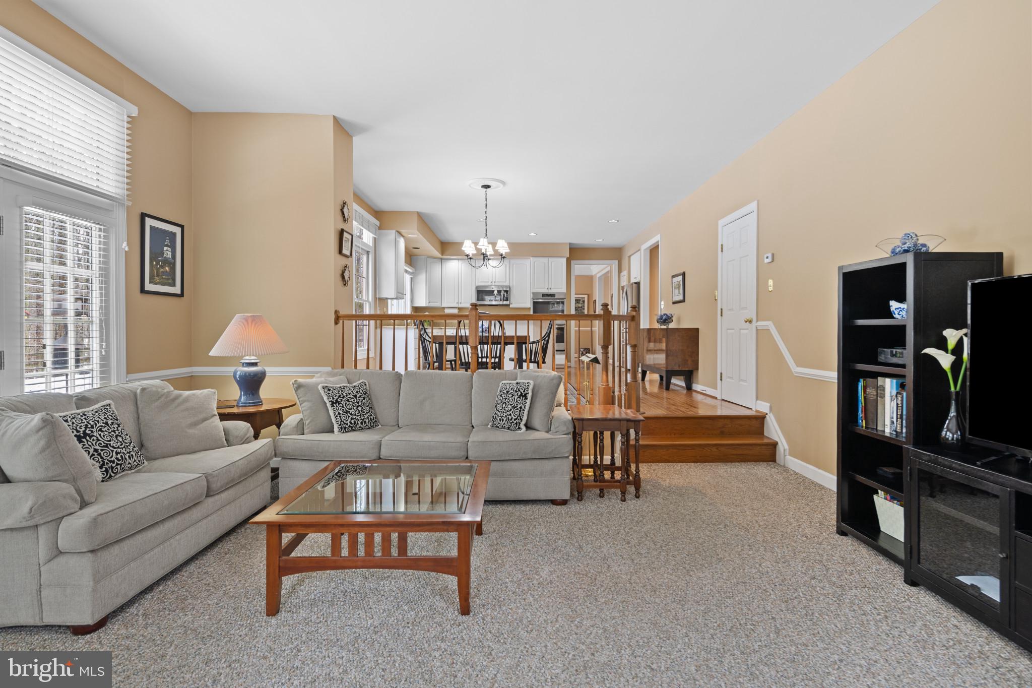 91 Colony Crossing Edgewater, MD 21037 - Photo 11 of 38 a living room with furniture and a flat screen tv