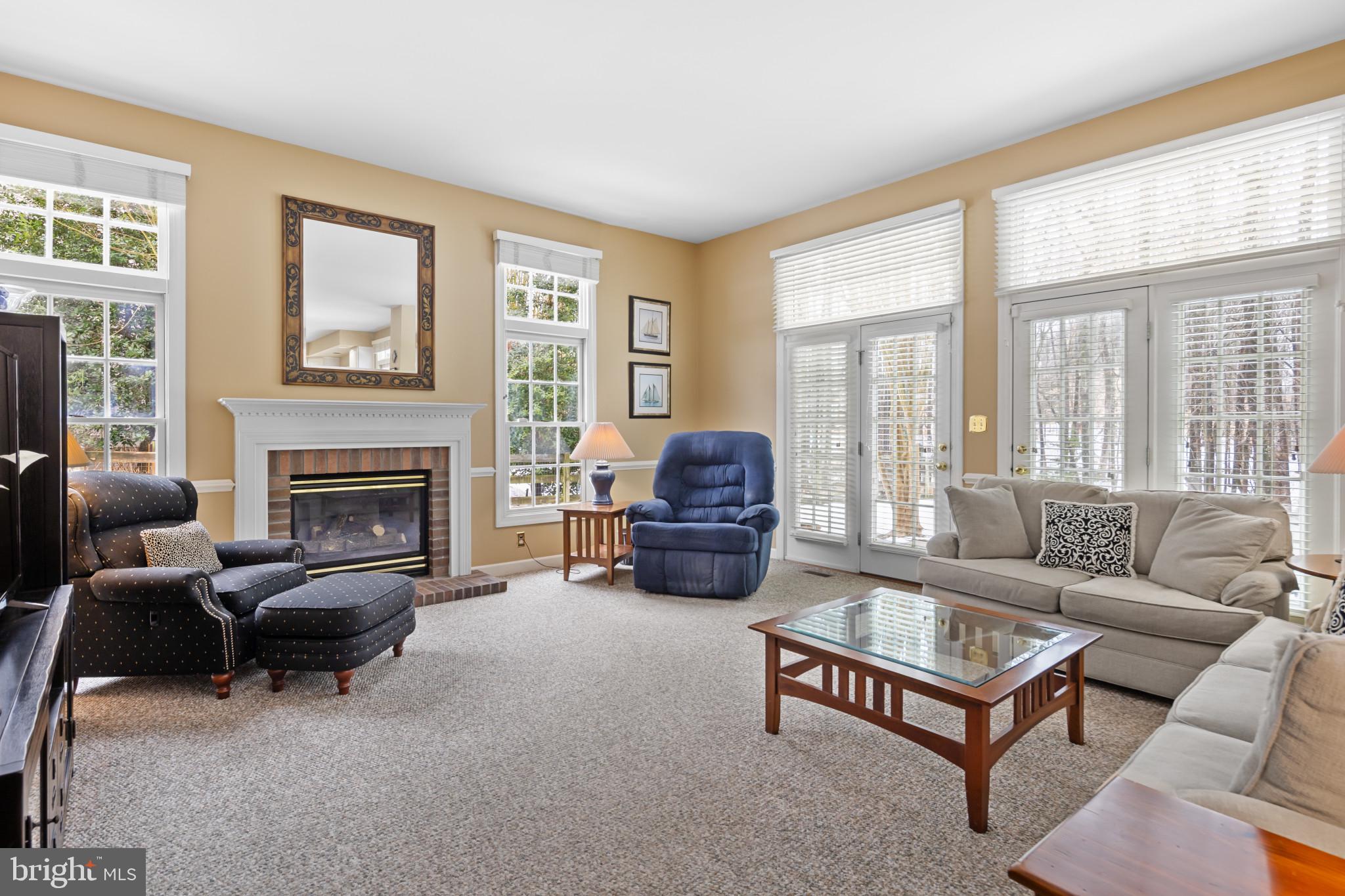 91 Colony Crossing Edgewater, MD 21037 - Photo 12 of 38 a living room with furniture and a fireplace