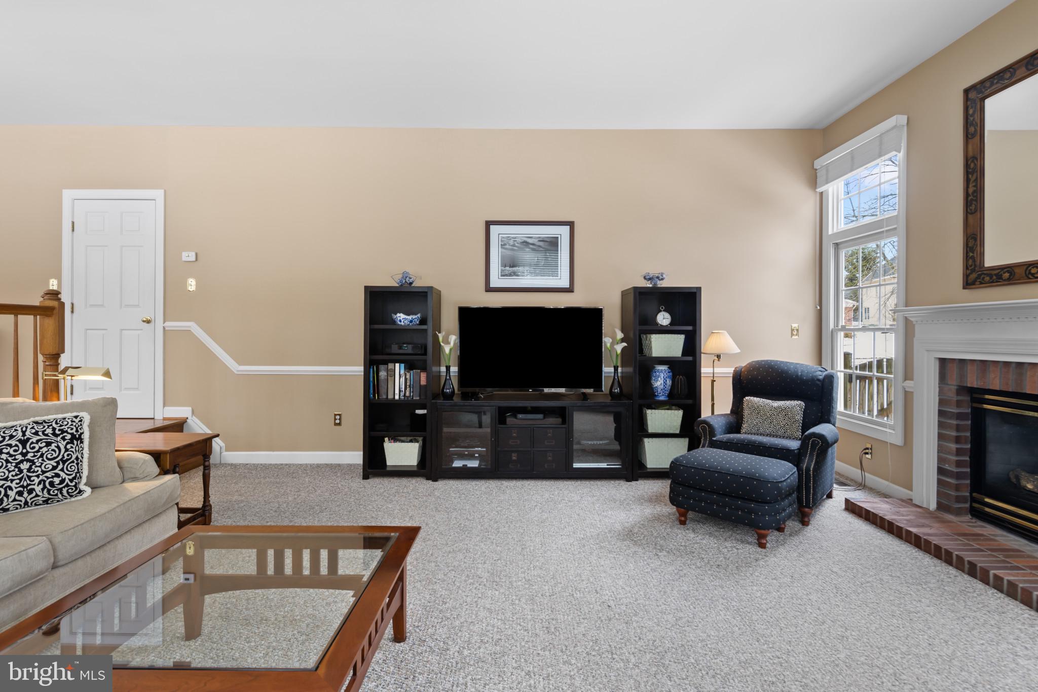 91 Colony Crossing Edgewater, MD 21037 - Photo 13 of 38 a living room with furniture and a flat screen tv