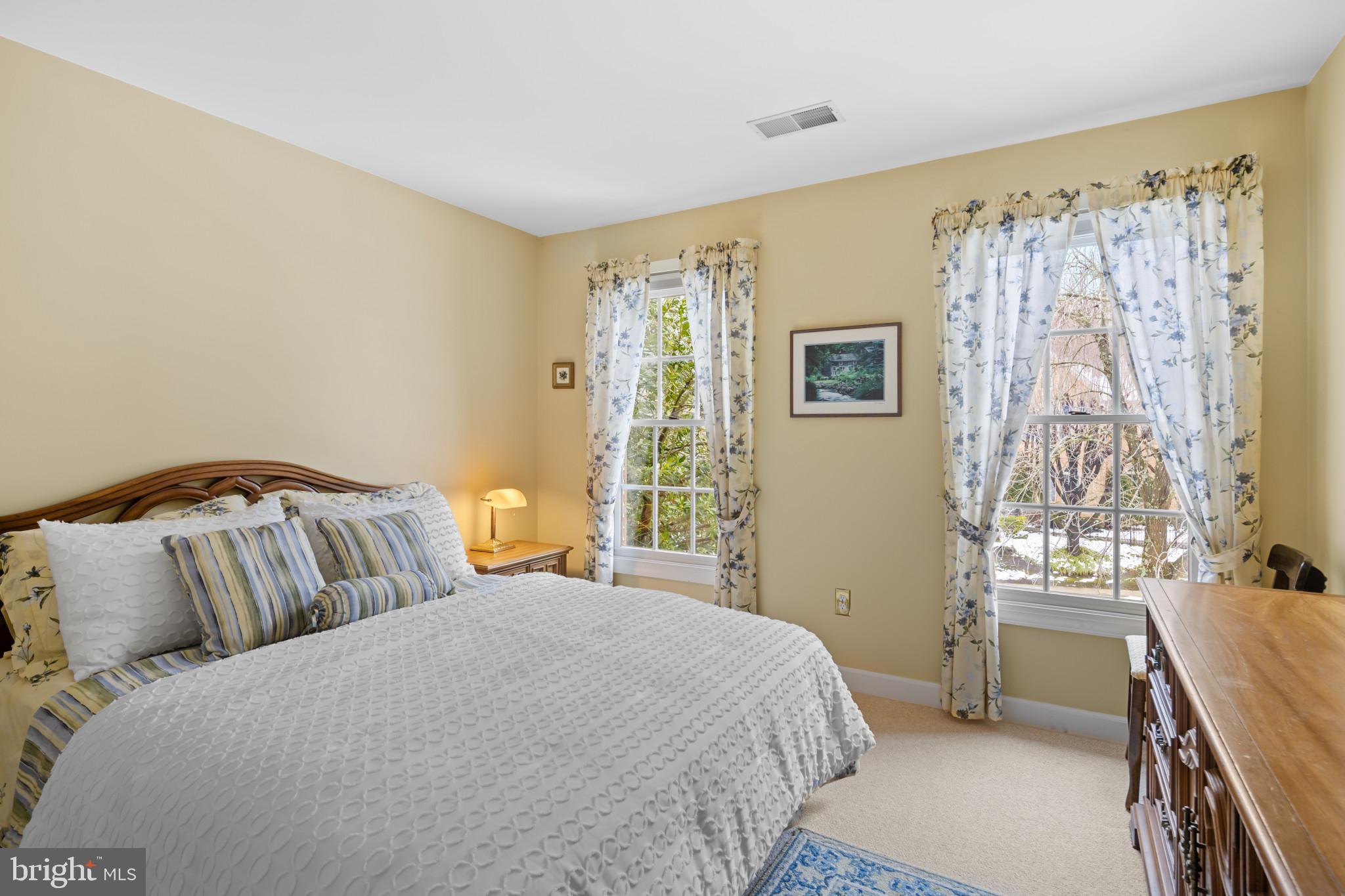 91 Colony Crossing Edgewater, MD 21037 - Photo 23 of 38 a bedroom with a bed and a window