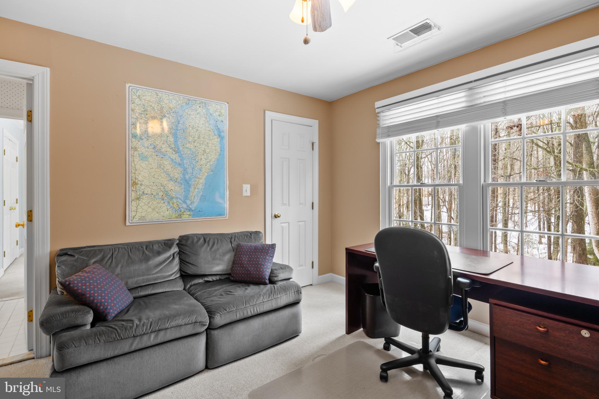 91 Colony Crossing Edgewater, MD 21037 - Photo 27 of 38 a living room with furniture and a window