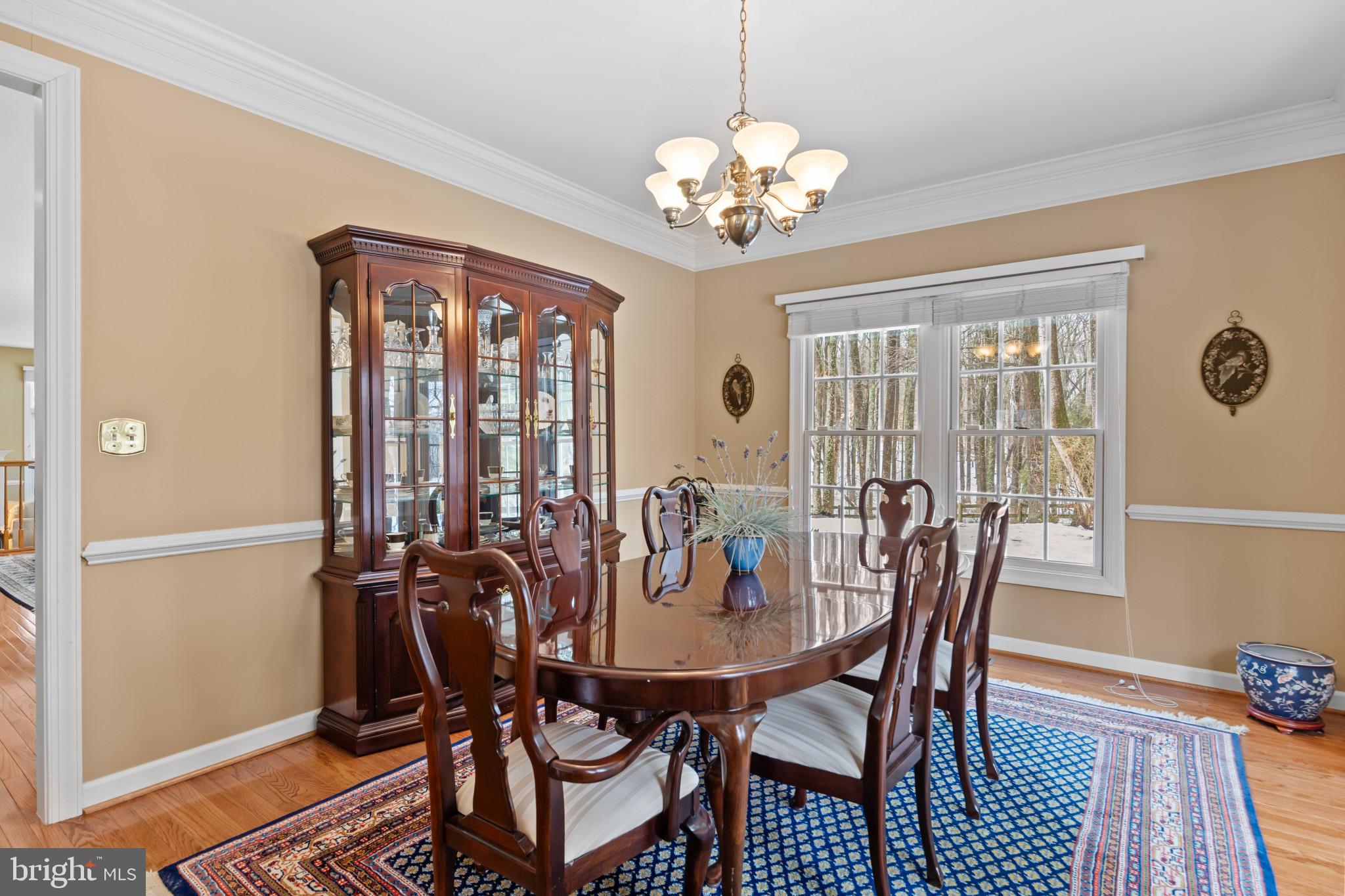 91 Colony Crossing Edgewater, MD 21037 - Photo 5 of 38 a view of a dining room with furniture window and wooden floor