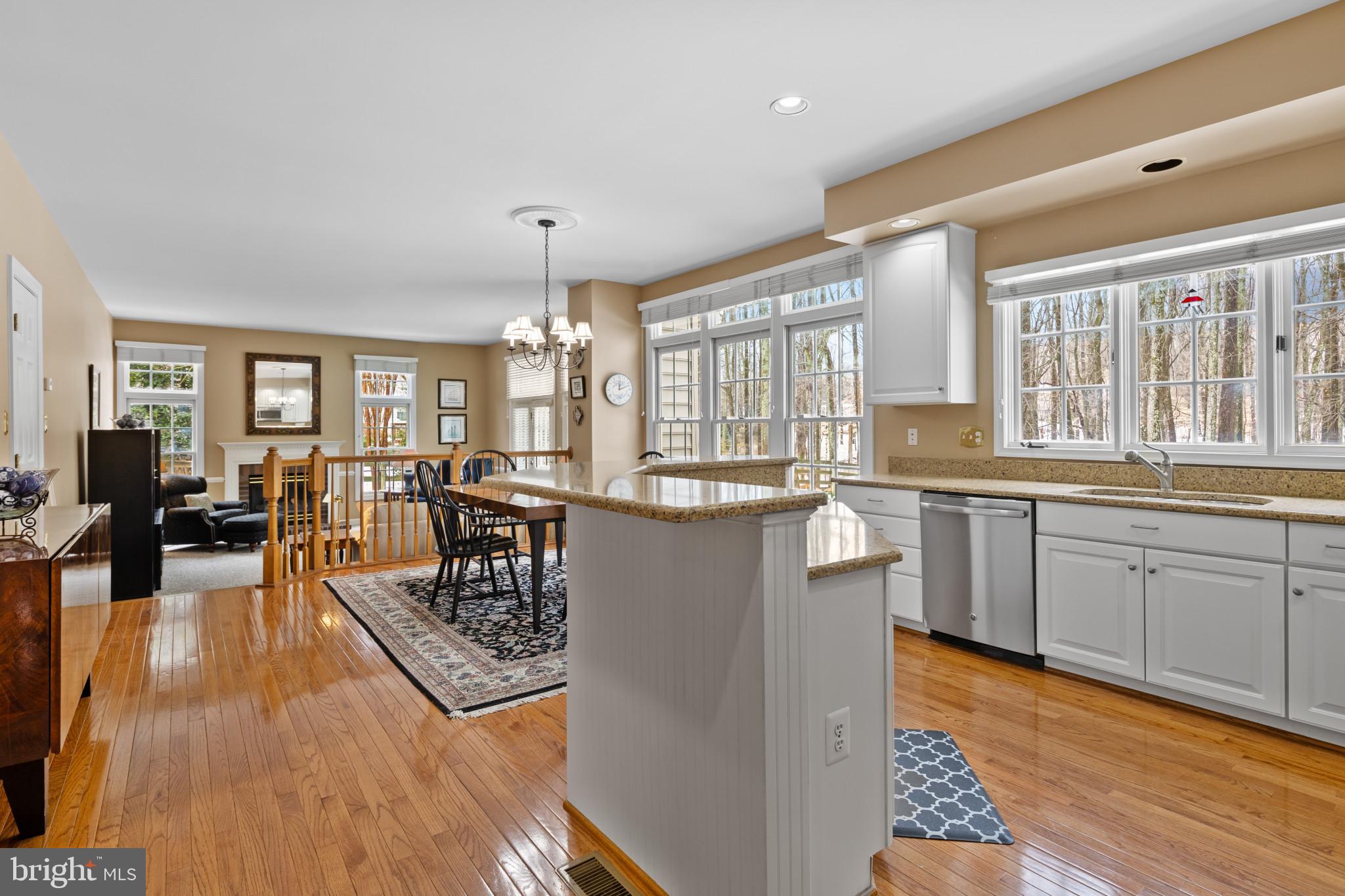 91 Colony Crossing Edgewater, MD 21037 - Photo 8 of 38 a large open kitchen with a large window and stainless steel appliances