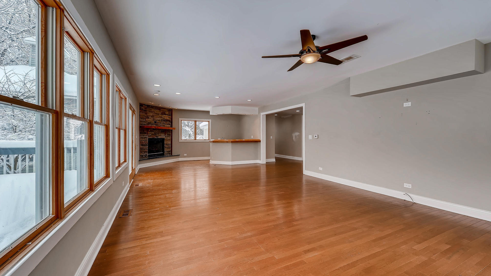 270 Country Commons Road Cary, IL 60013 - Photo 15 of 39 a view of empty room with wooden floor and fan