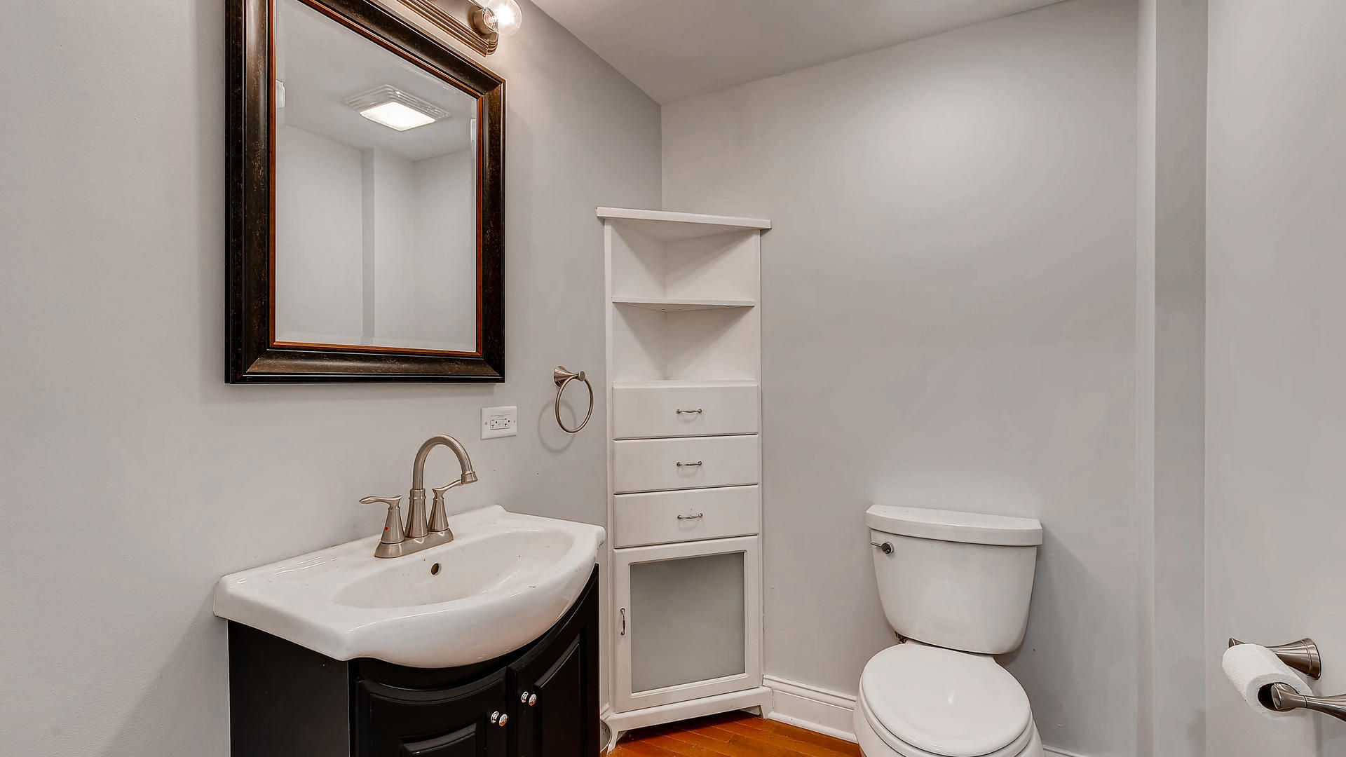 270 Country Commons Road Cary, IL 60013 - Photo 16 of 39 a bathroom with a toilet sink and mirror