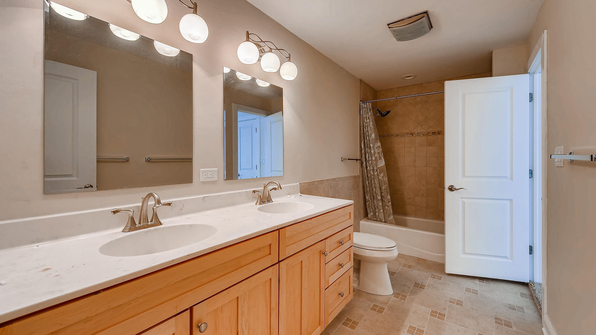 270 Country Commons Road Cary, IL 60013 - Photo 28 of 39 a bathroom with a sink a toilet and shower