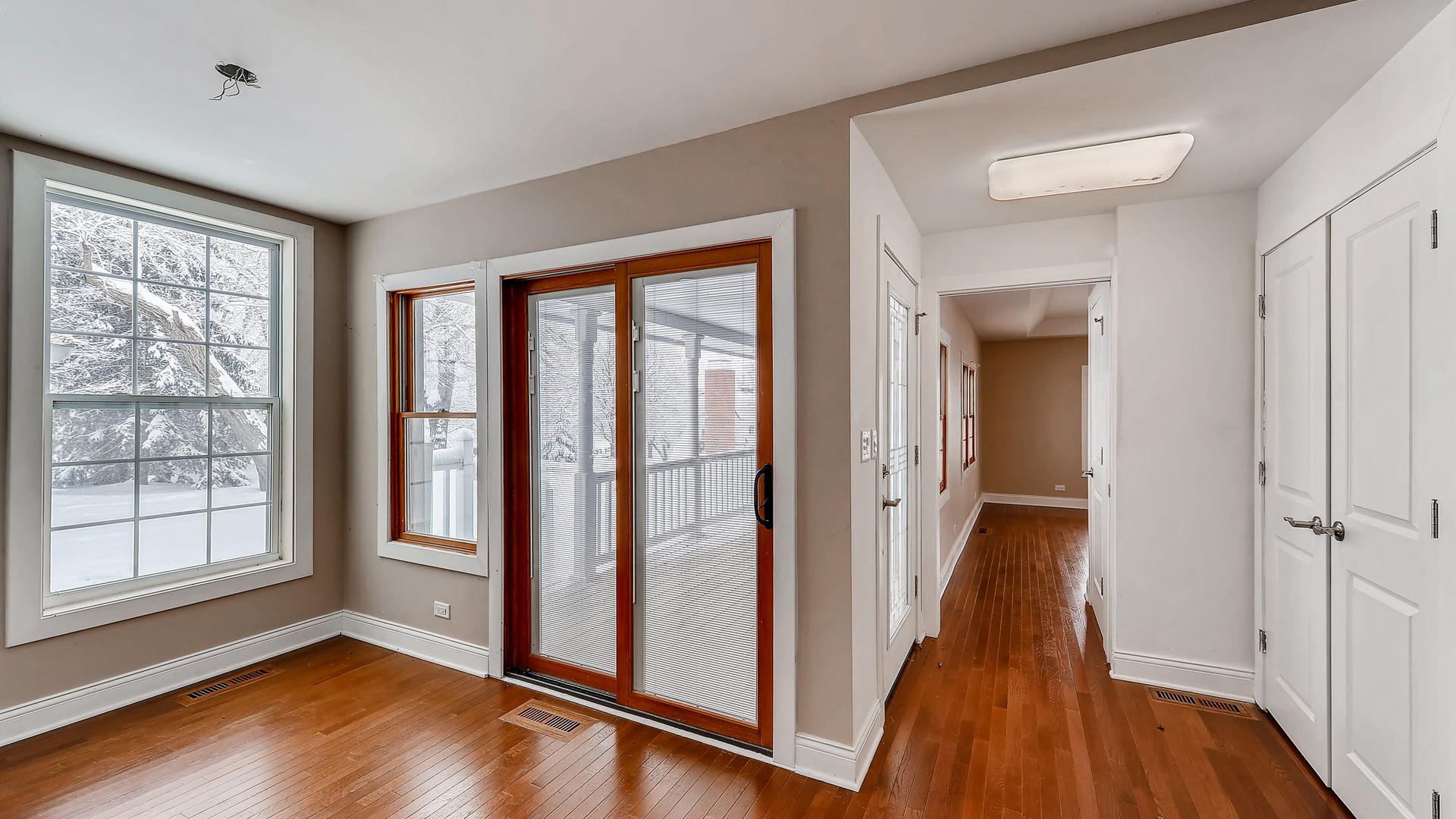 270 Country Commons Road Cary, IL 60013 - Photo 4 of 39 a view of a hallway with wooden floor and entryway