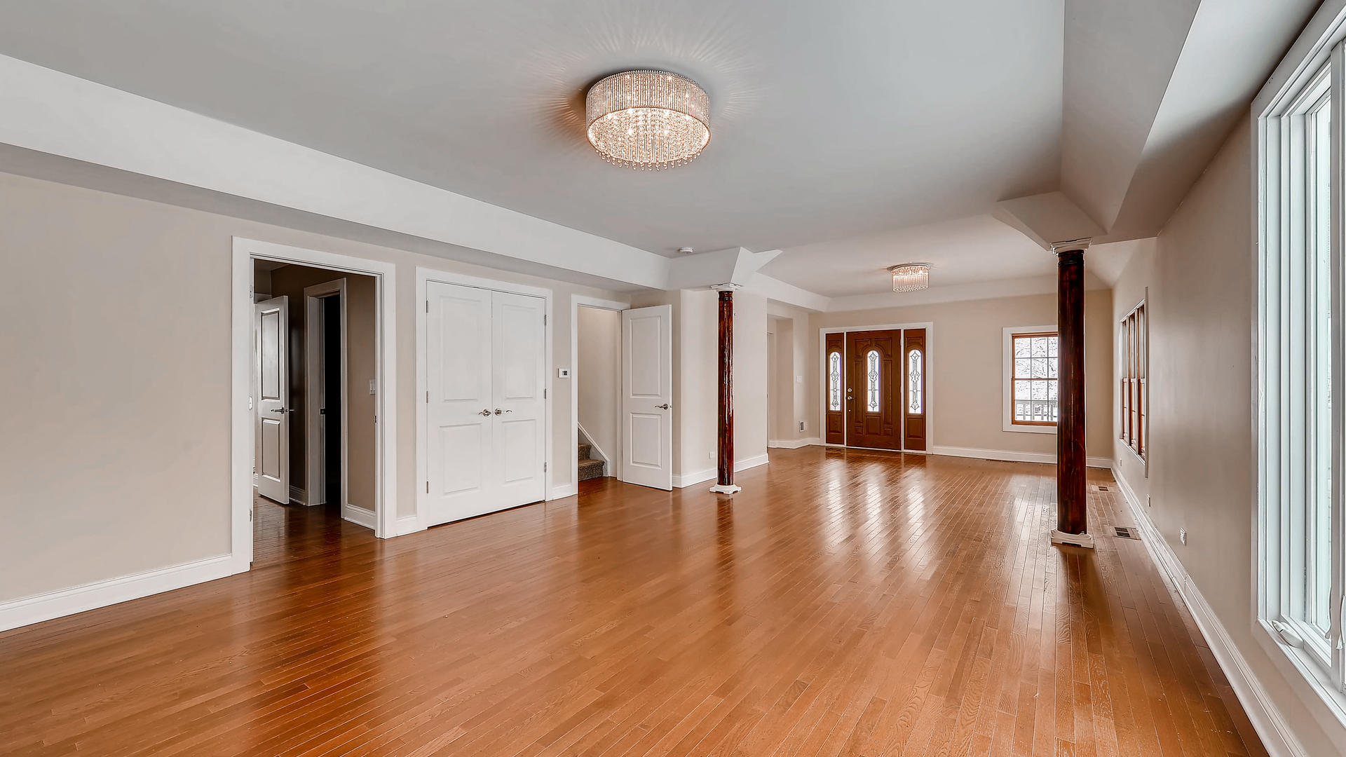 270 Country Commons Road Cary, IL 60013 - Photo 6 of 39 a view of a hallway with wooden floor