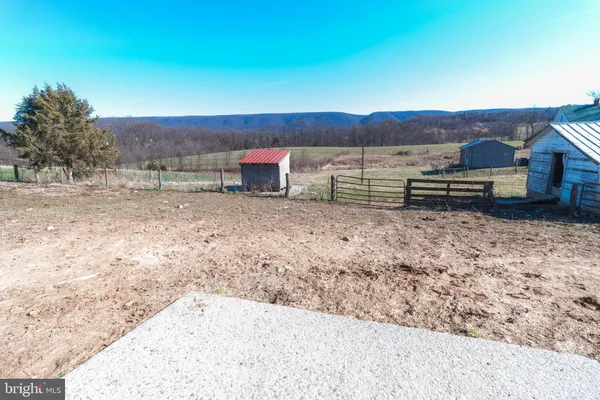 an aerial view of a house with a lake view