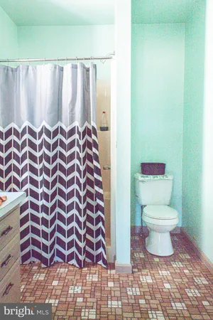 a room with furniture and a wooden floor