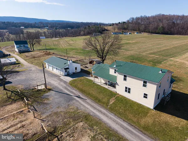 a view of an ocean and a mountain