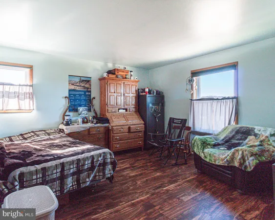 a workspace with furniture and a window