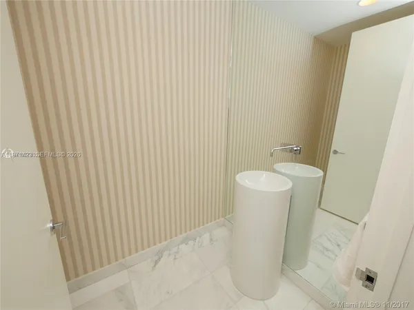 a view of a bathroom with a toilet