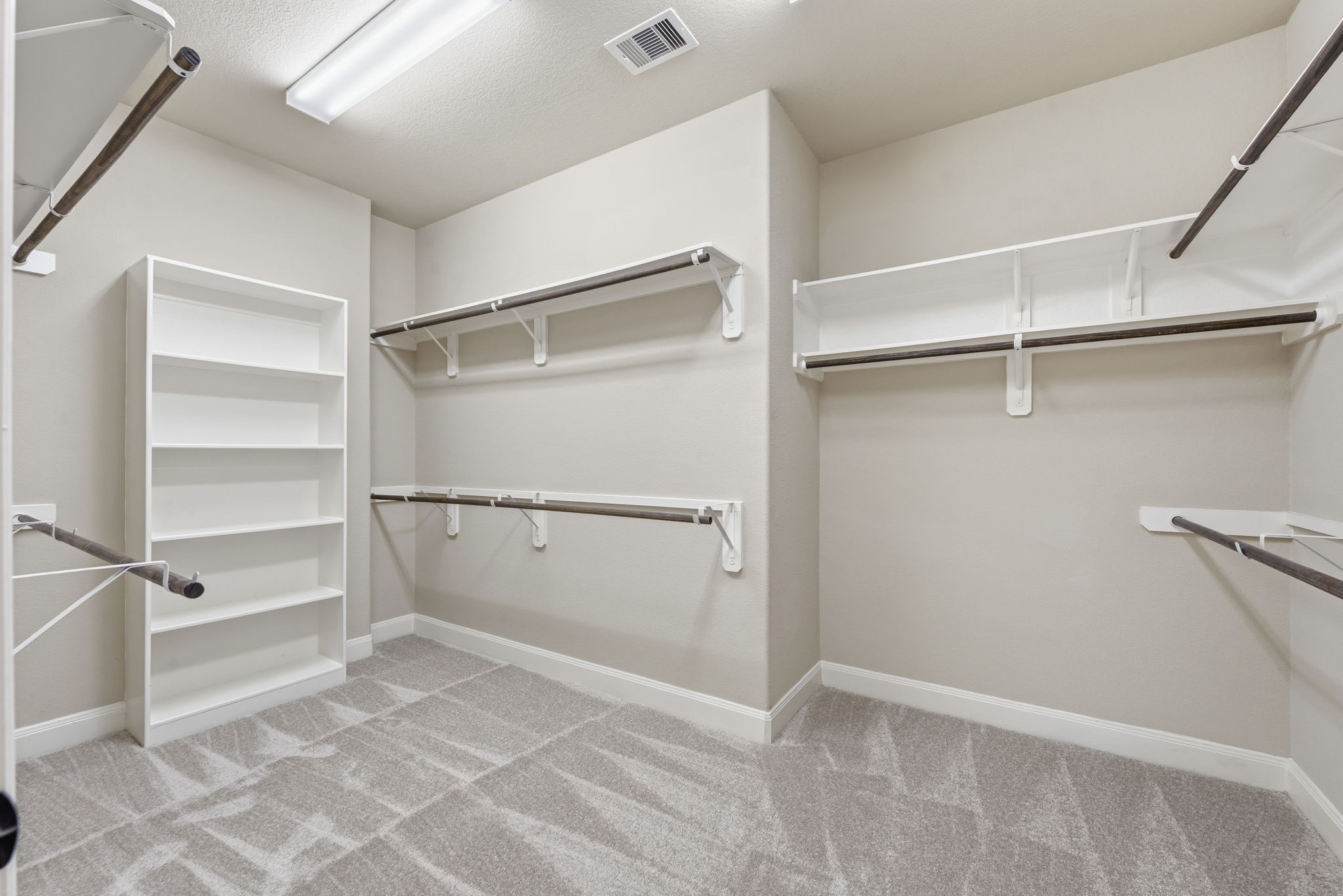 25210 Gaddis Oaks Drive Spring, TX 77389 - Photo 22 of 50 a view of an empty walk in closet