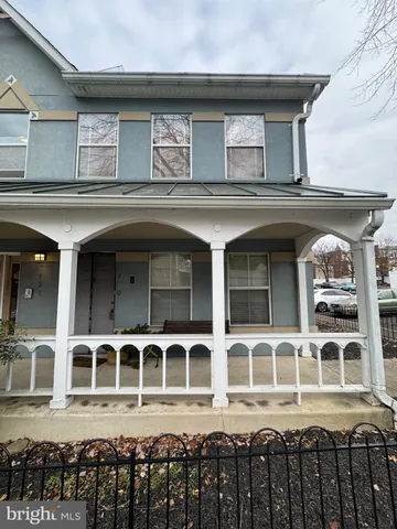 a black and white building with a lot of windows