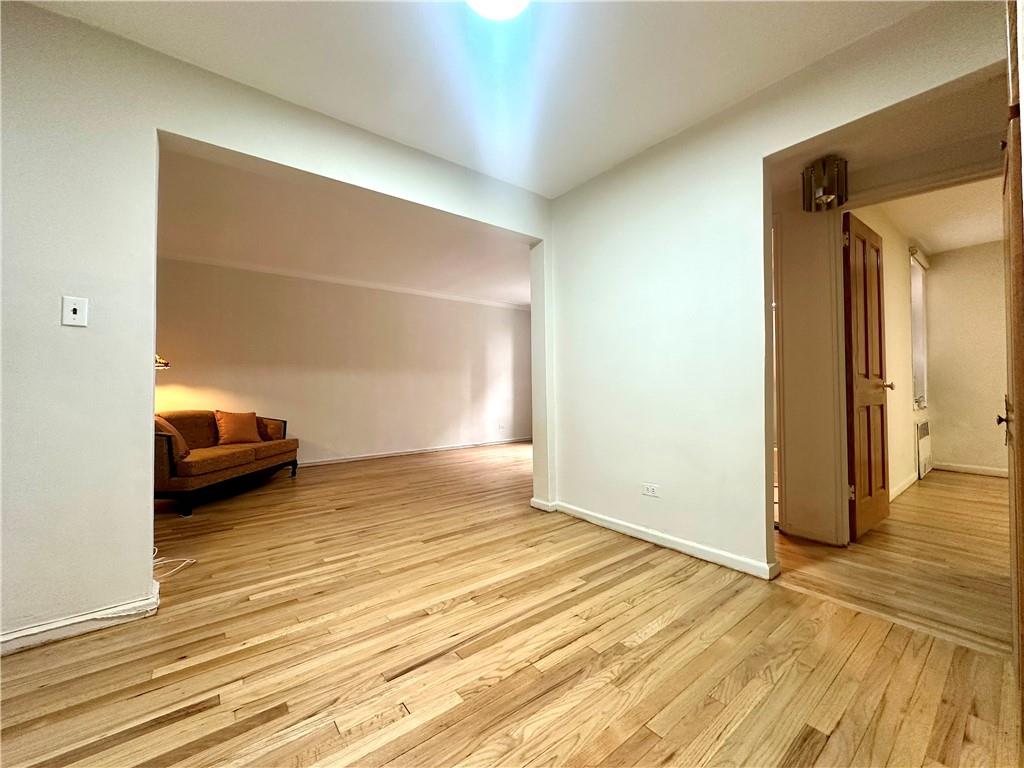 3060 Ocean Avenue, Unit 2C Brooklyn, NY 11235 - Photo 2 of 20 a view of a room that has a bed and a window