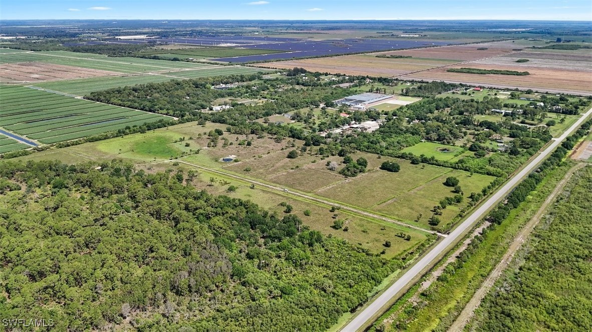 2777 Everhigh Acres Road Clewiston, FL 33440 - Photo 2 of 8 a view of a lush green field