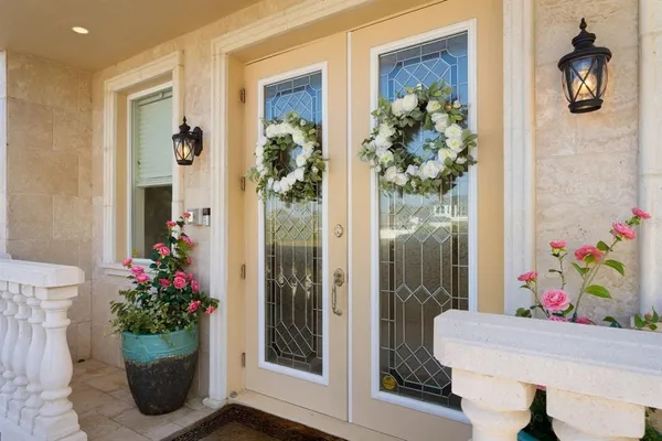 a view of a dining room with furniture window and flowerpot