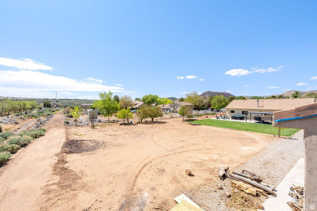 7776 Wagon Road East St. George, UT 84770 - Photo 59 of 76 View of yard featuring a patio area