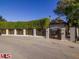 1018 North Tigertail Road Los Angeles, CA 90049 - Photo 1 of 1 front view of a house with a street