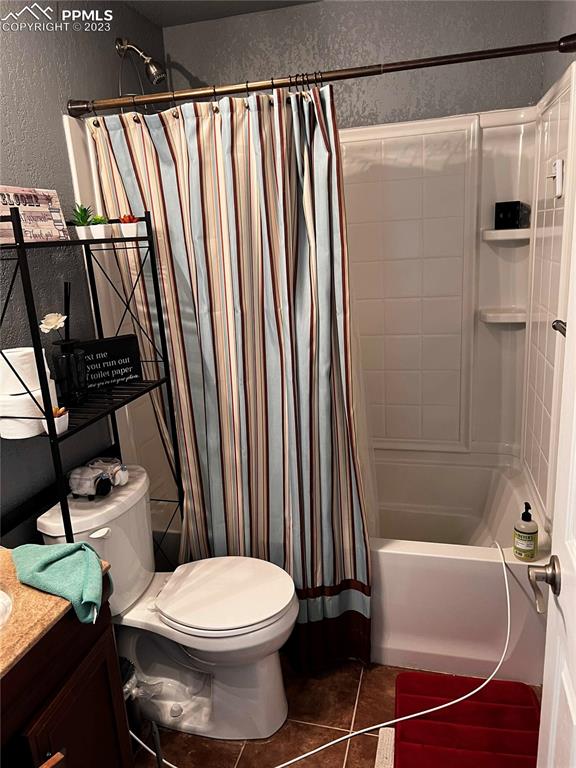 6350 Dancing Moon Way Colorado Springs, CO 80911 - Photo 9 of 12 a bathroom with a toilet and a shower